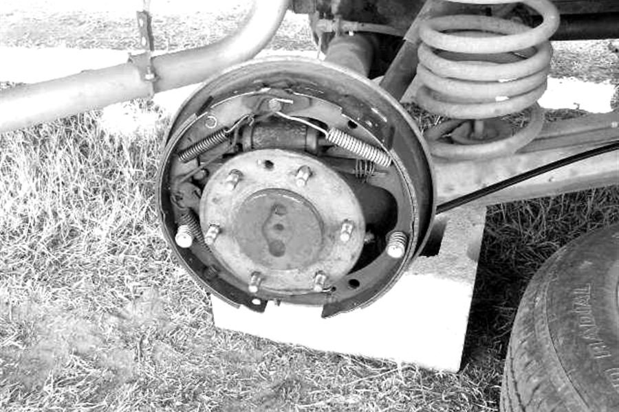 Drum brake assembly with shoes and hardware